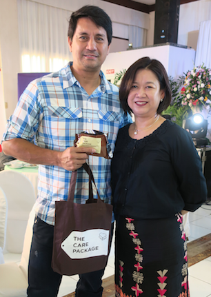 Ormoc City Mayor Richard Gomez and Pilmico's Chief Resource Officer Maribeth Marasigan with The Care Package