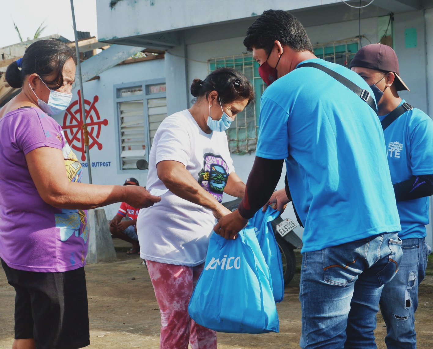 Pilmico distributing relief goods