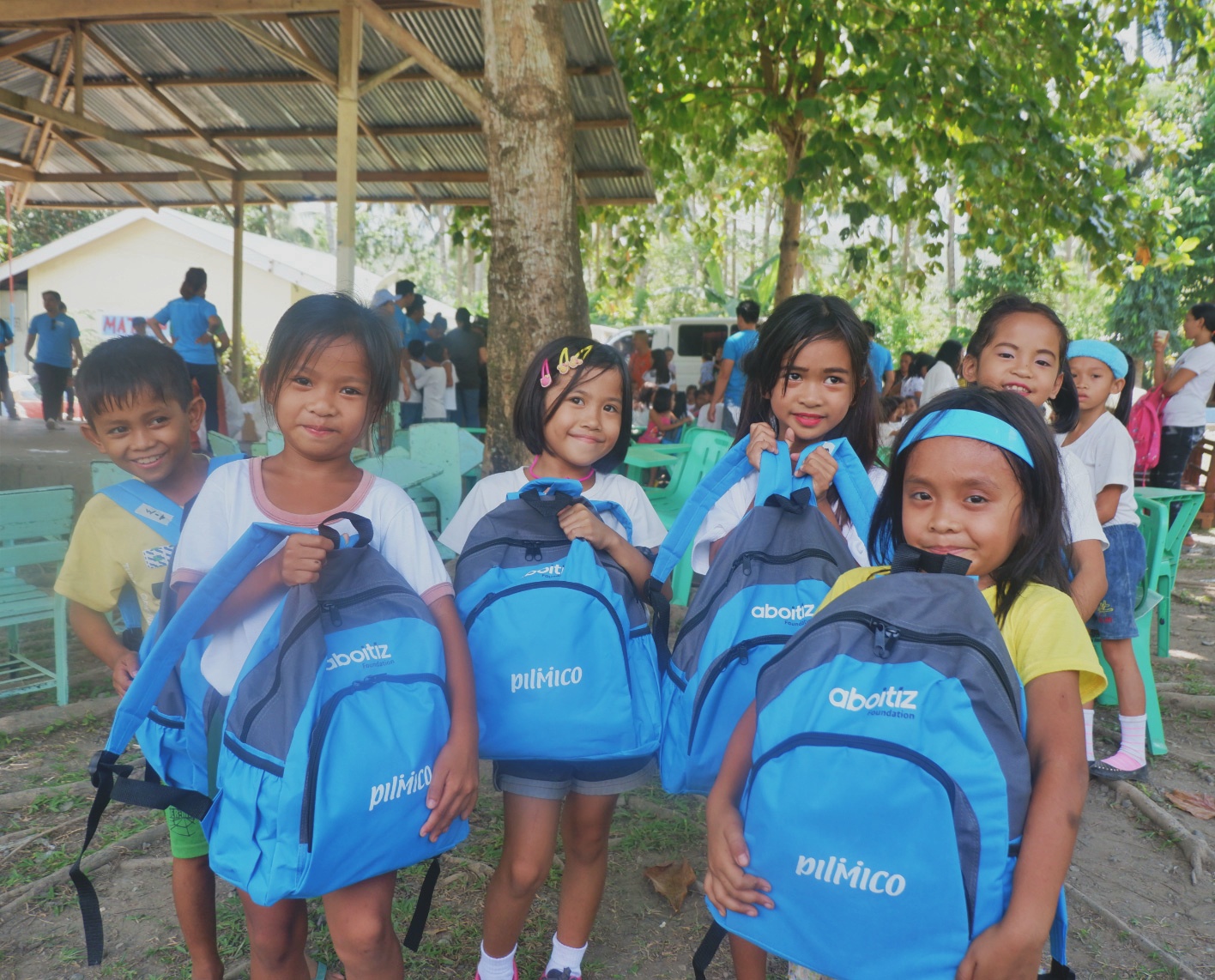 Kids happy with their Pilmico bags