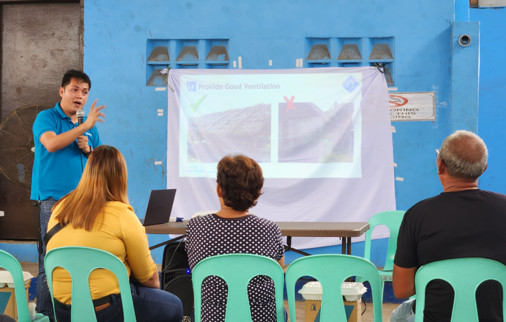 Beneficiaries listening to a Pilmico trainer.